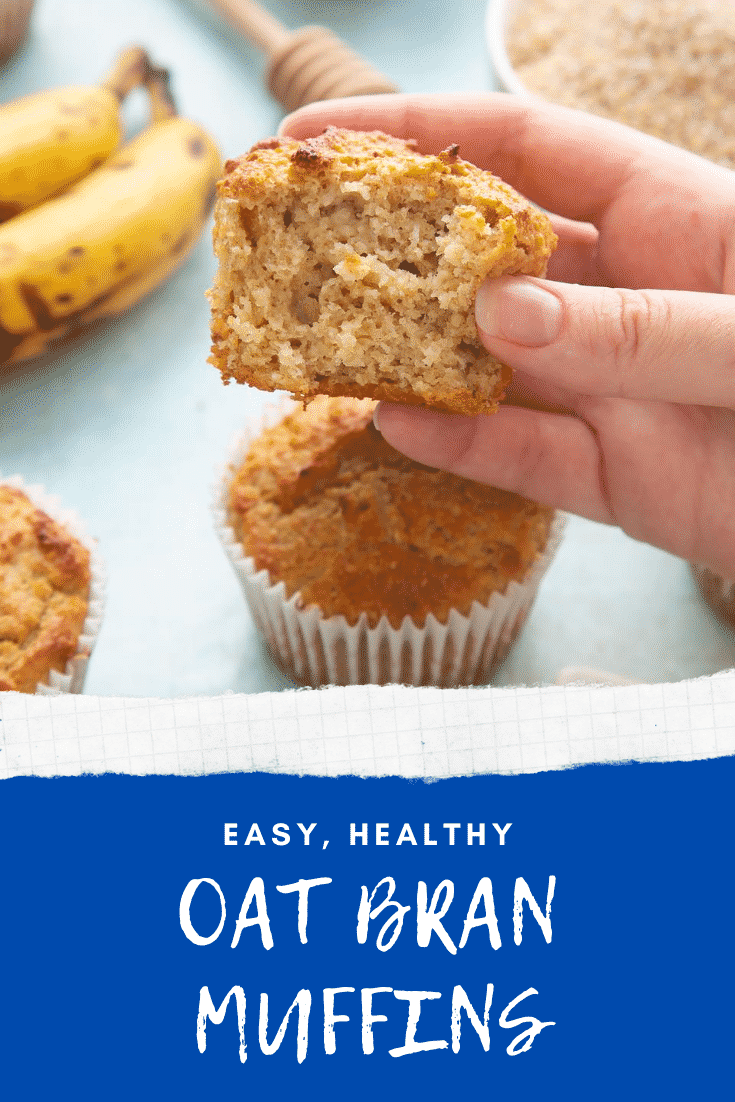 Front angle shot of a hand holding a half eaten breakfast muffin with graphic text EASY, HEALTHY OAT BRAN MUFFINS below