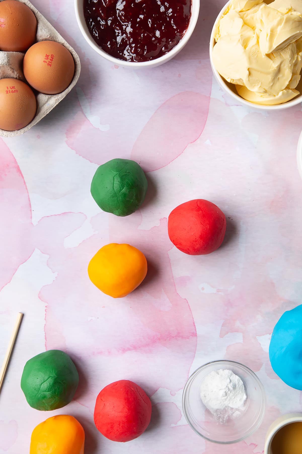 Overhead shot of balls of sugar paste. 