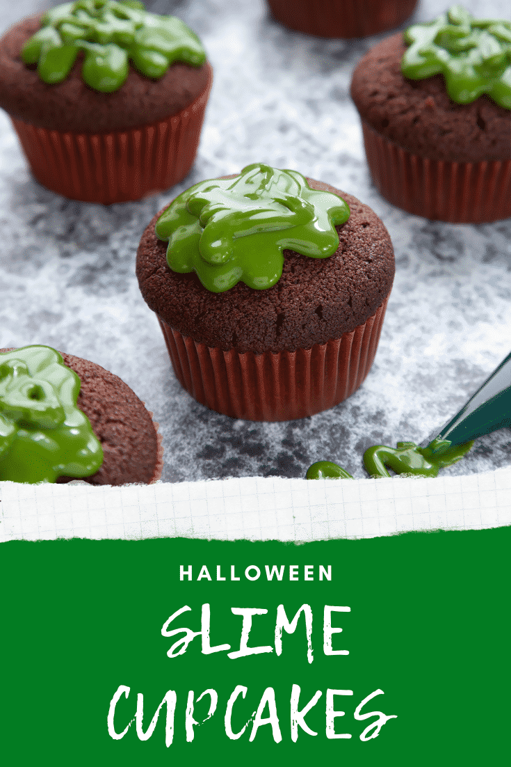 Slime cupcakes on a black backdrop. The cakes have a chocolate sponge topped with dyed-green caramel. Caption reads: Halloween slime cupcakes