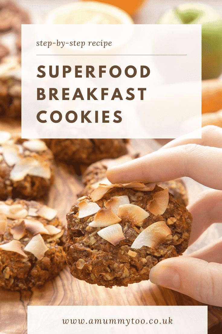 graphic text SUPERFOOD BREAKFAST COOKIES above Overhead shot of a hand holding a breakfast cookie