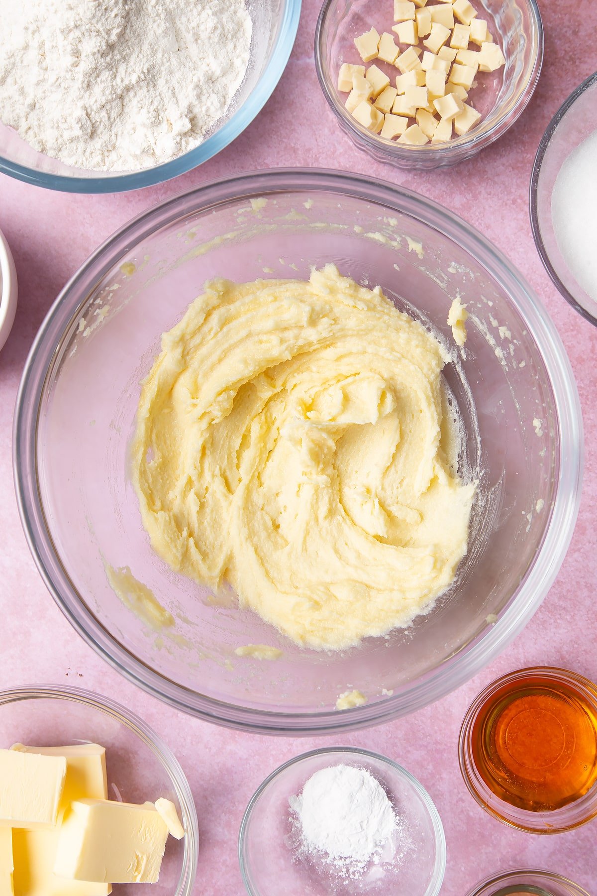 Overhead shot of butter mix in a large clear bowl