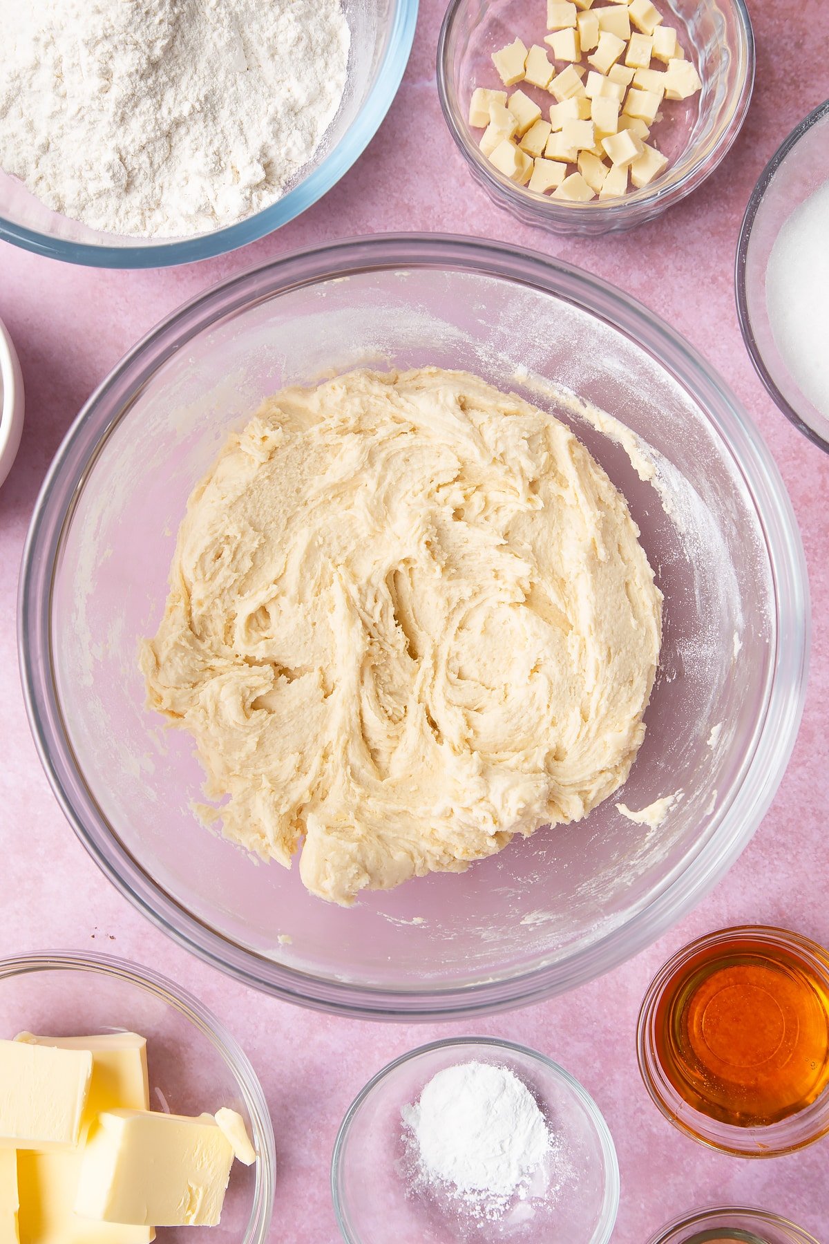 Overhead shot of flour and baking powder in a mixing bowl