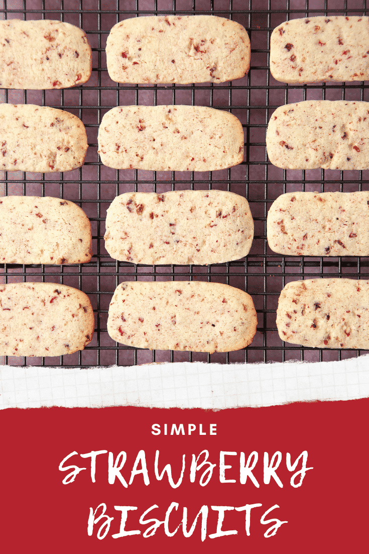 Strawberry biscuits cooling on a wire rack. Text at the bottom of the image says 'Simple Strawberry Biscuits'.