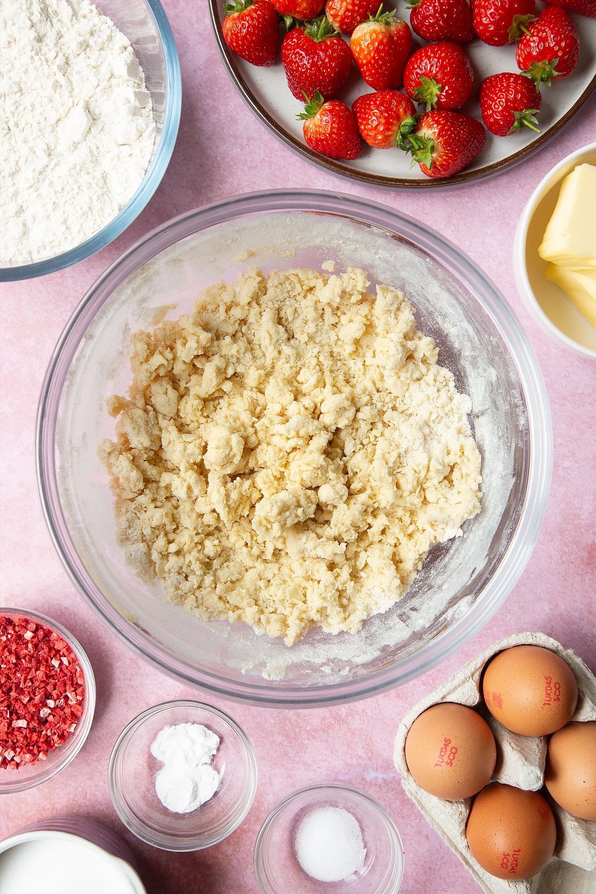 The strawberry biscuit mixture mixed together using a whisk. 