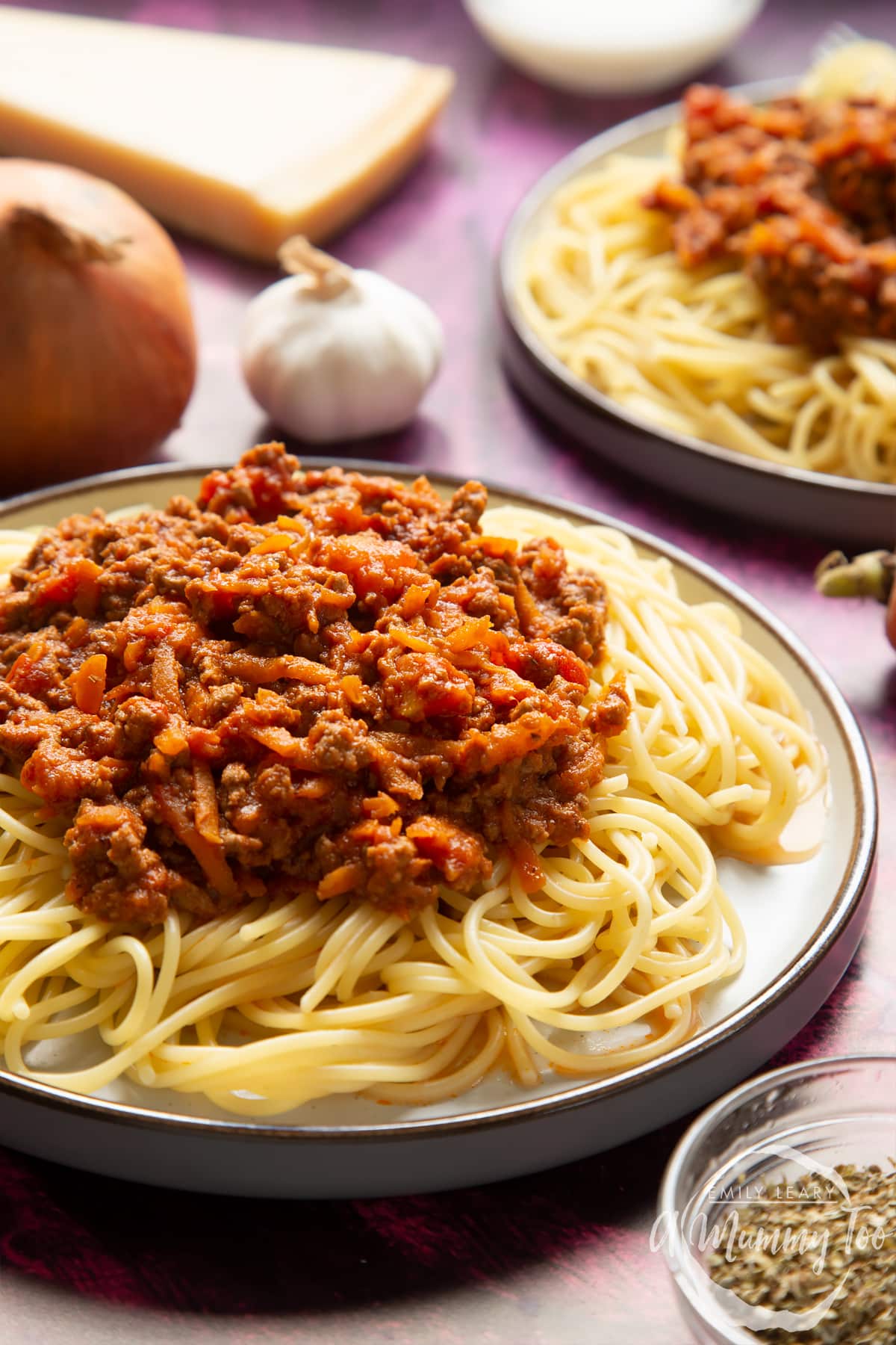 Side view of spaghetti bolognese Gordon Ramsay style served on plates. 