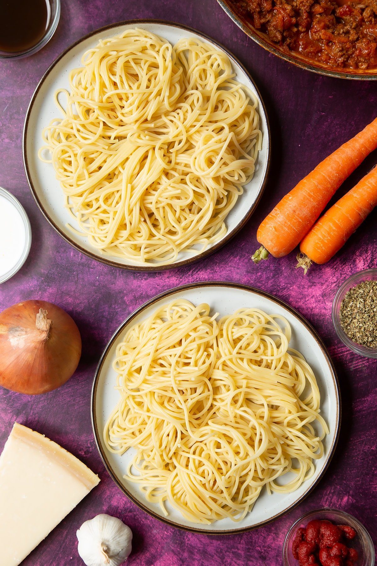 Spaghetti served on plates.