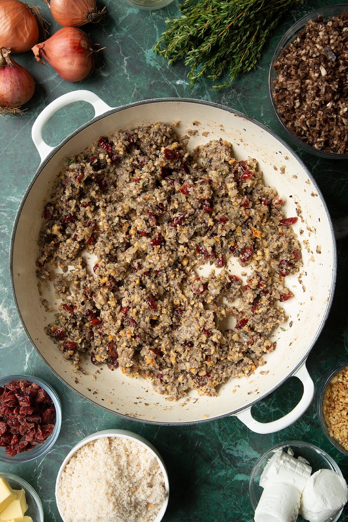 Overhead shot of mushroom filling in a large frying pan