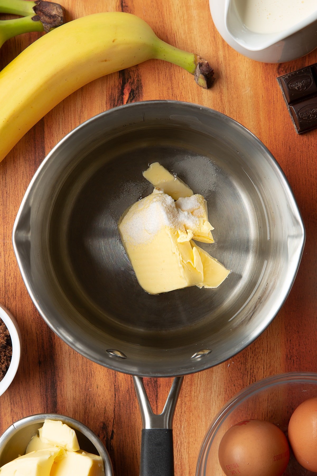 Overhead shot of butter, salt and water in a pan