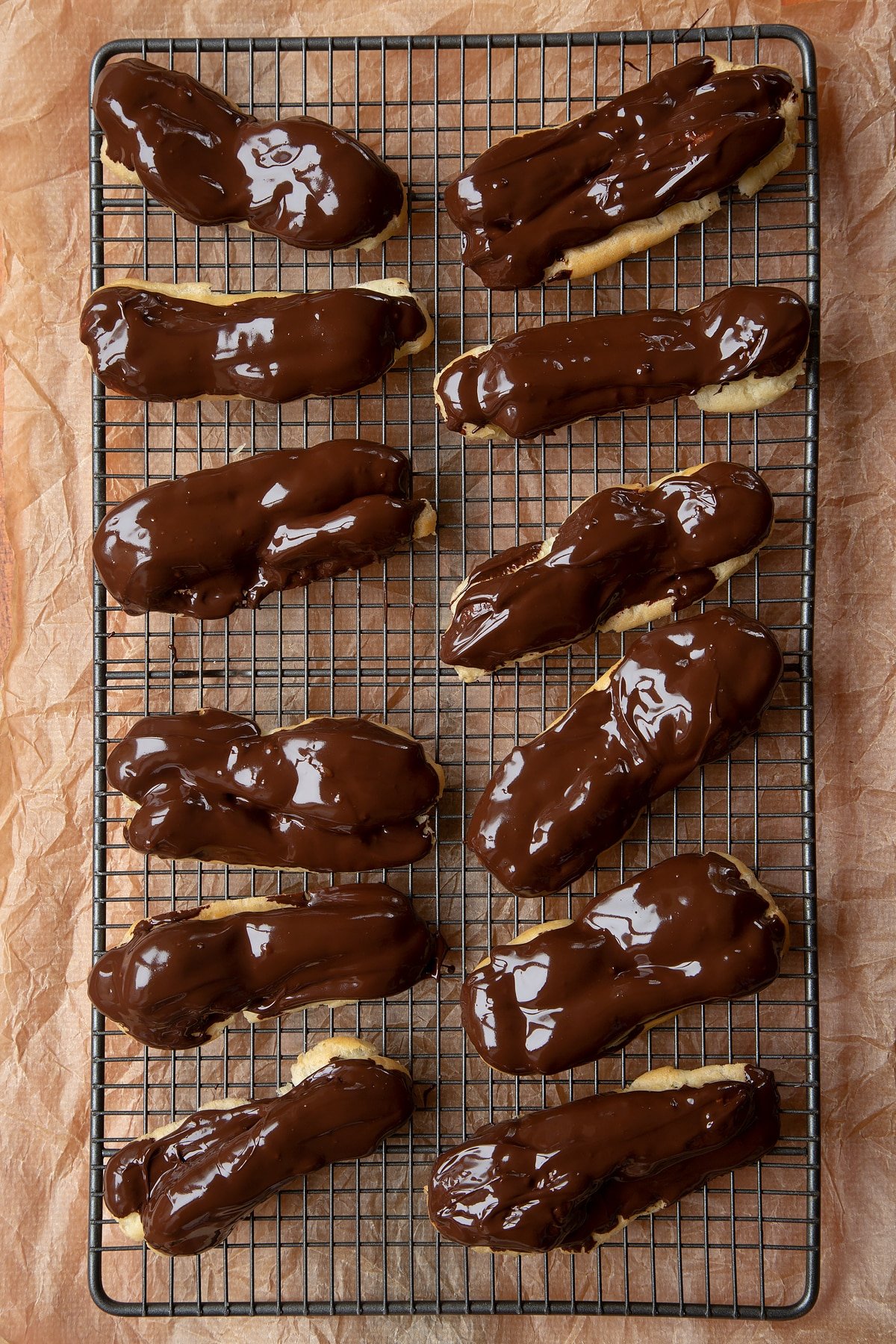 Melted chocolate coated on the top of the choux pastry. 