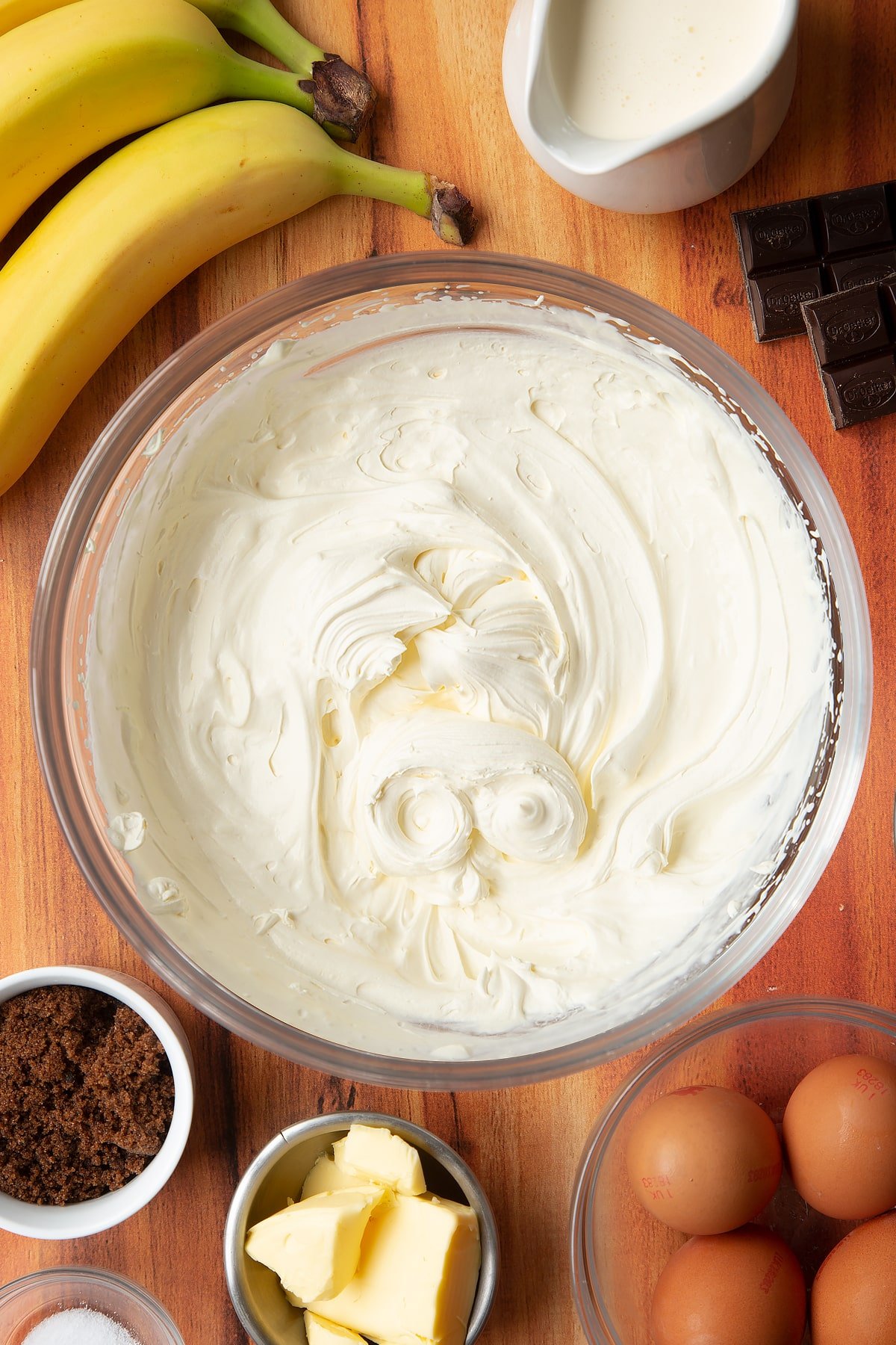 Whipped cream mixed in a mixing bowl.