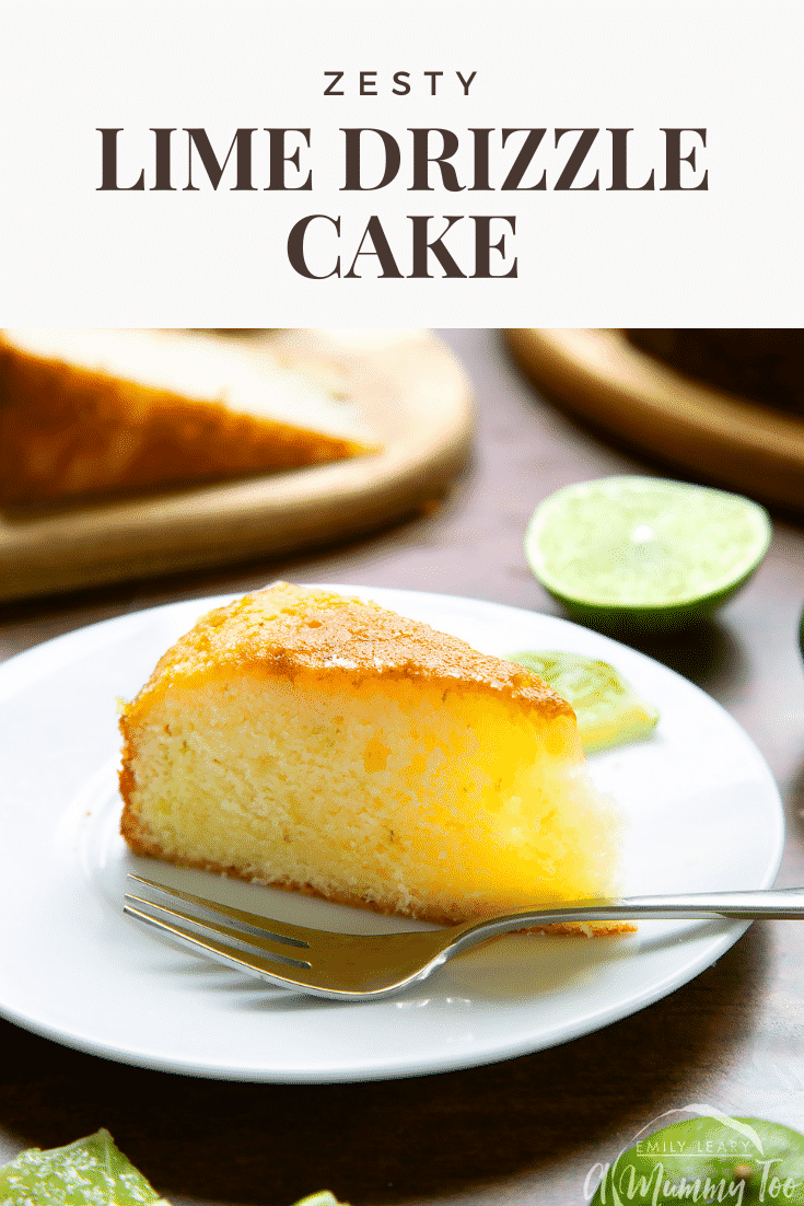 Slice of lime drizzle cake standing on a white plate with a fork. Caption reads: zesty lime drizzle cake