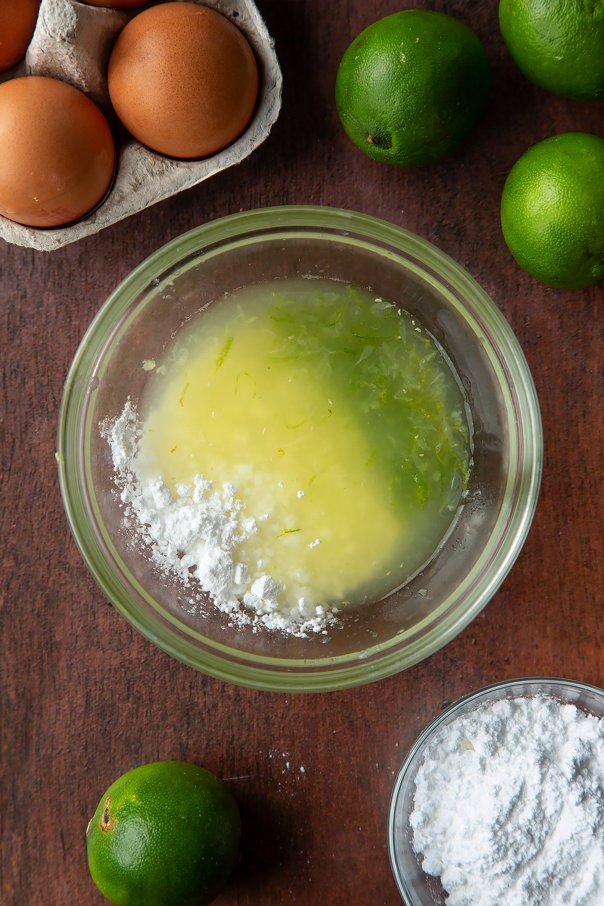 Lime juice and zest and icing sugar in a small bowl.