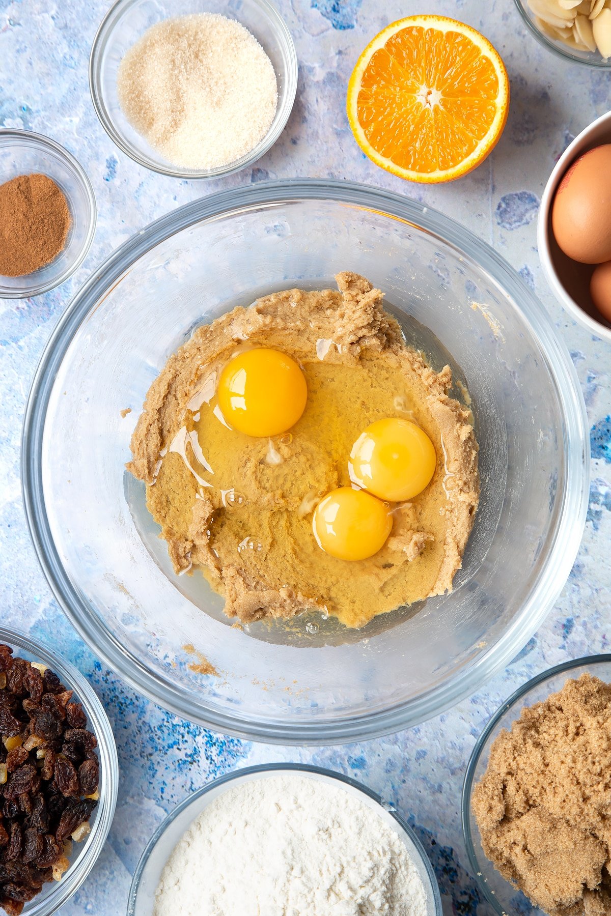 Overhead shot of butter mix and eggs in a large mixing bowl