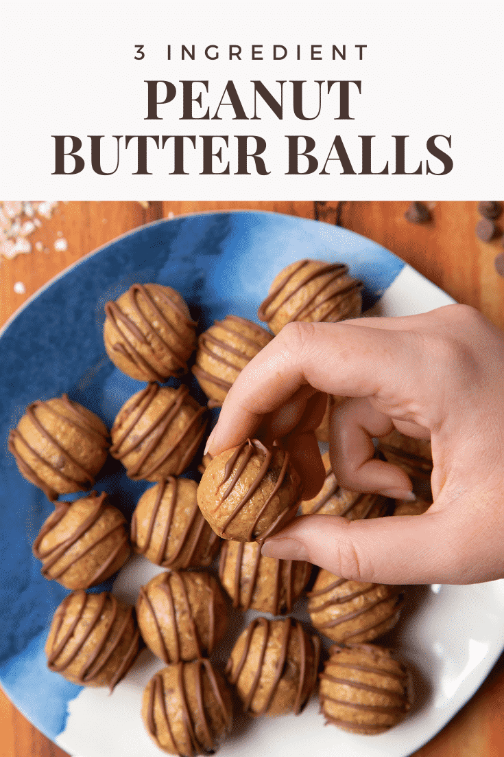 Peanut butter and oatmeal balls decorated with chocolate on a blue and white plate. A hand holds one. Caption reads: 3 ingredient peanut butter balls 