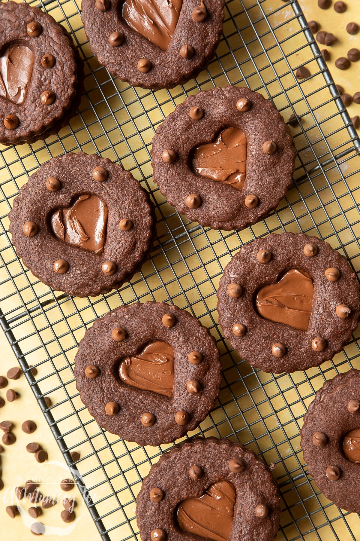 Nutella sandwich cookies on a cooling rack.