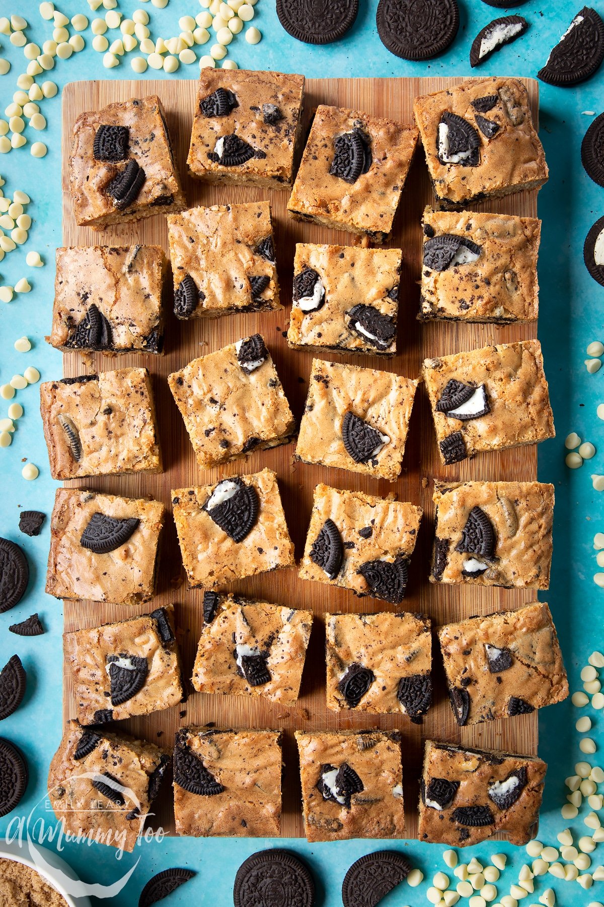 Overhead view of square Oreo Blondies on a wooden board