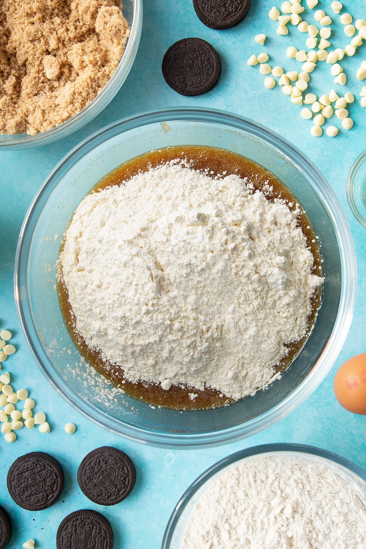 Overhead shot of melted butter mix with flour and baking powder