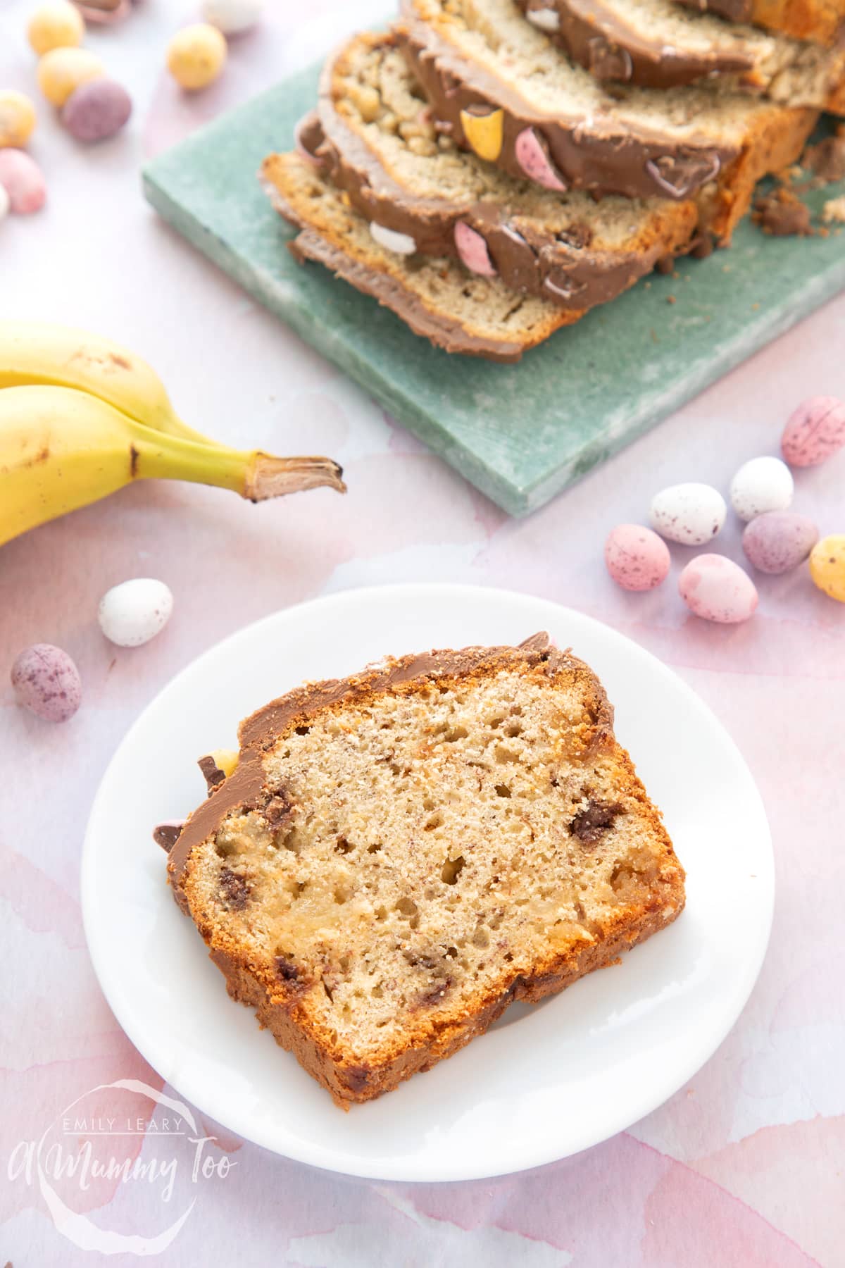 A slice of Easter banana bread on a white plate.