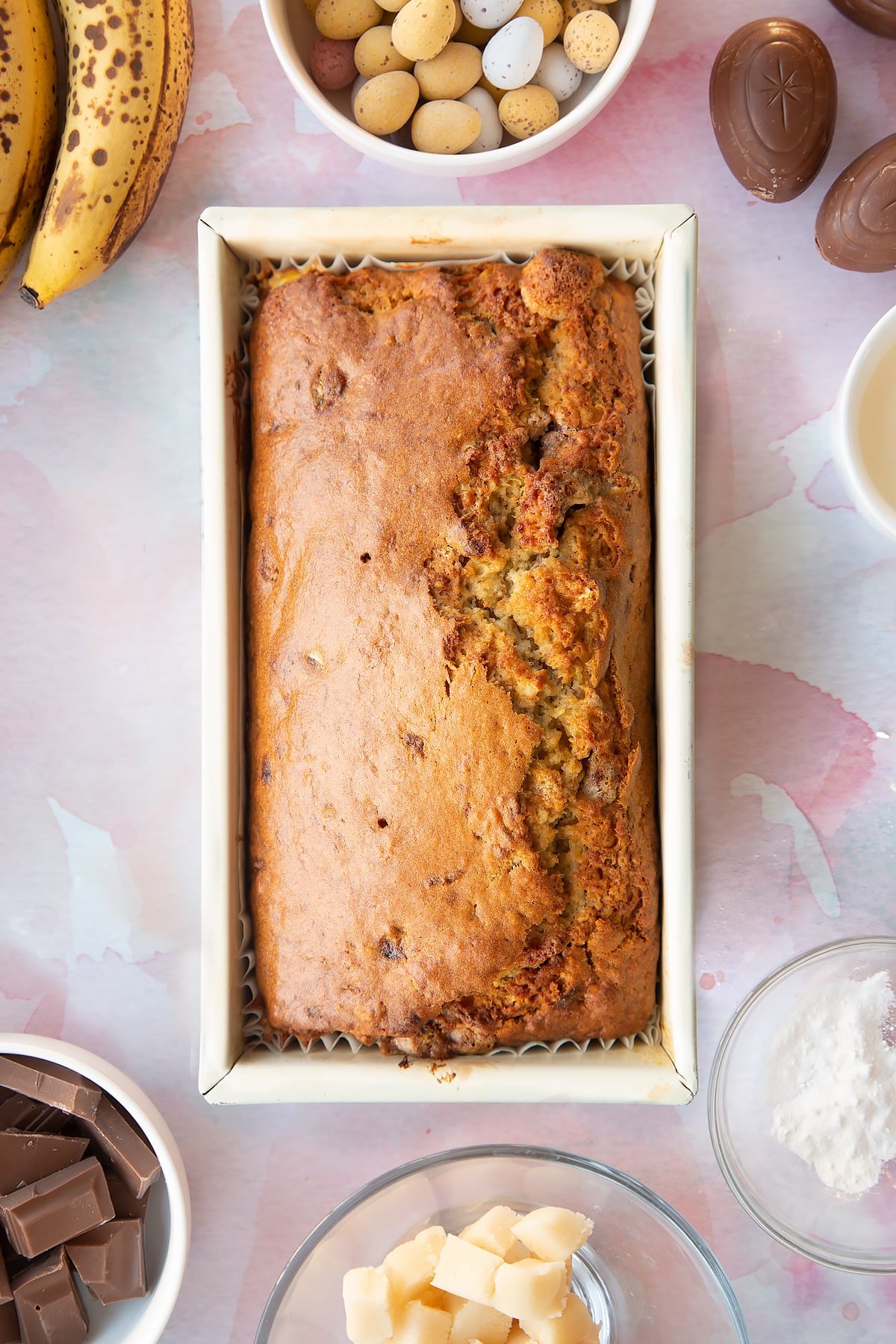 Easter banana bread, freshly baked in a tin.