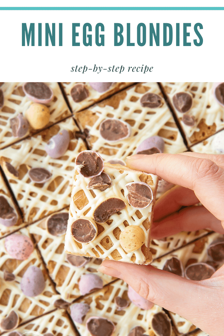 Hand holding a Mini Egg blondie with more behind. Caption reads: Mini Egg blondies step-by-step recipe