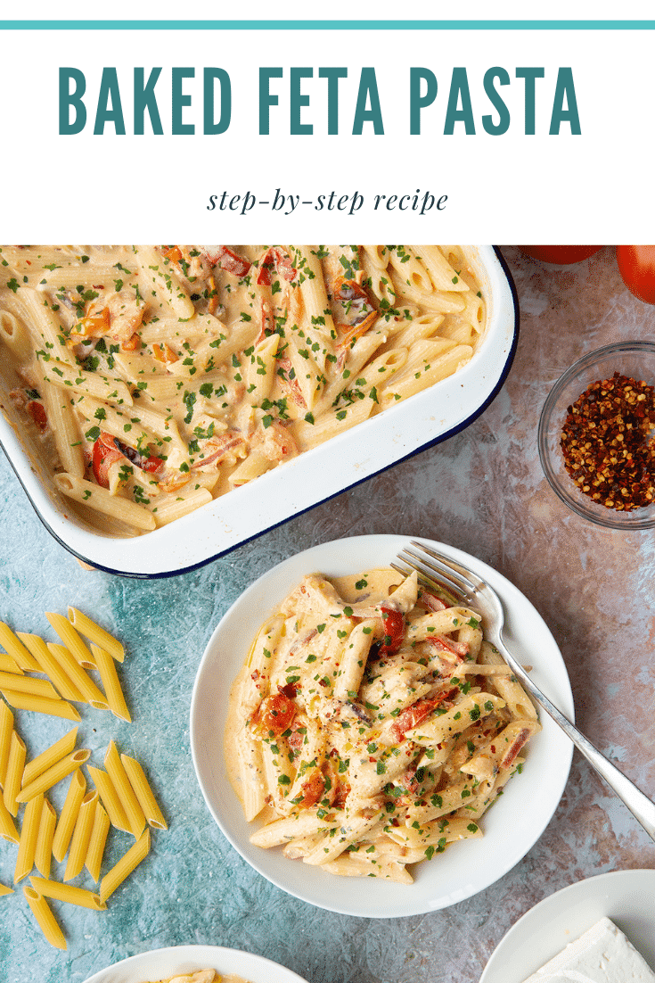 Baked feta pasta in a white bowl, garnished with parsley and chilli flakes. Caption reads: baked feta pasta step-by-step recipe.