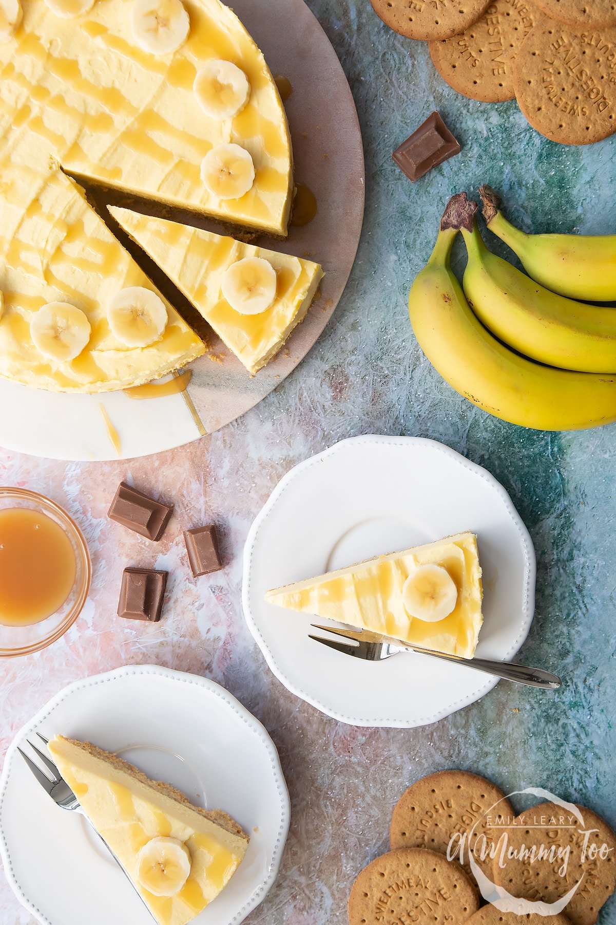 Slices of banoffee pie cheesecake on white plates.