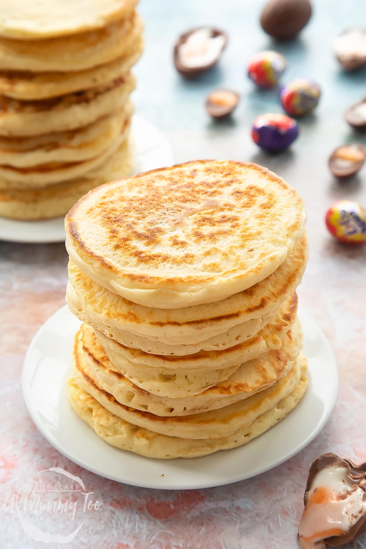 A tall stack of Creme Egg pancakes on a small white plate. 