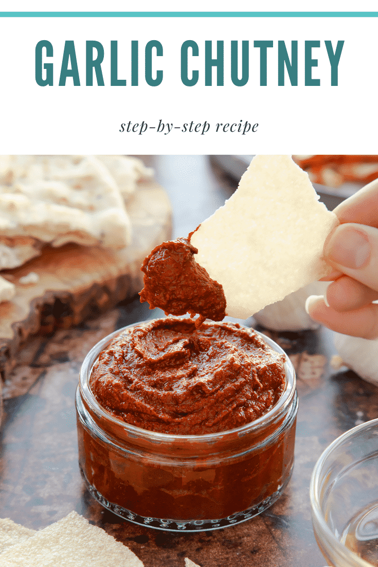 graphic text step-by-step recipe GARLIC CHUTNEY above Overhead shot of a hand holding a piece of bread dipped into garlic puree with website URL below