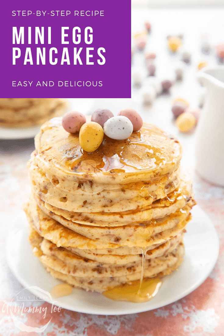 Tall, fluffy Mini Egg pancakes on a white plate in a tall stack. They are drizzled with syrup and topped with Mini Eggs. Caption reads: step-by-step recipe Mini Egg pancakes easy and delicious