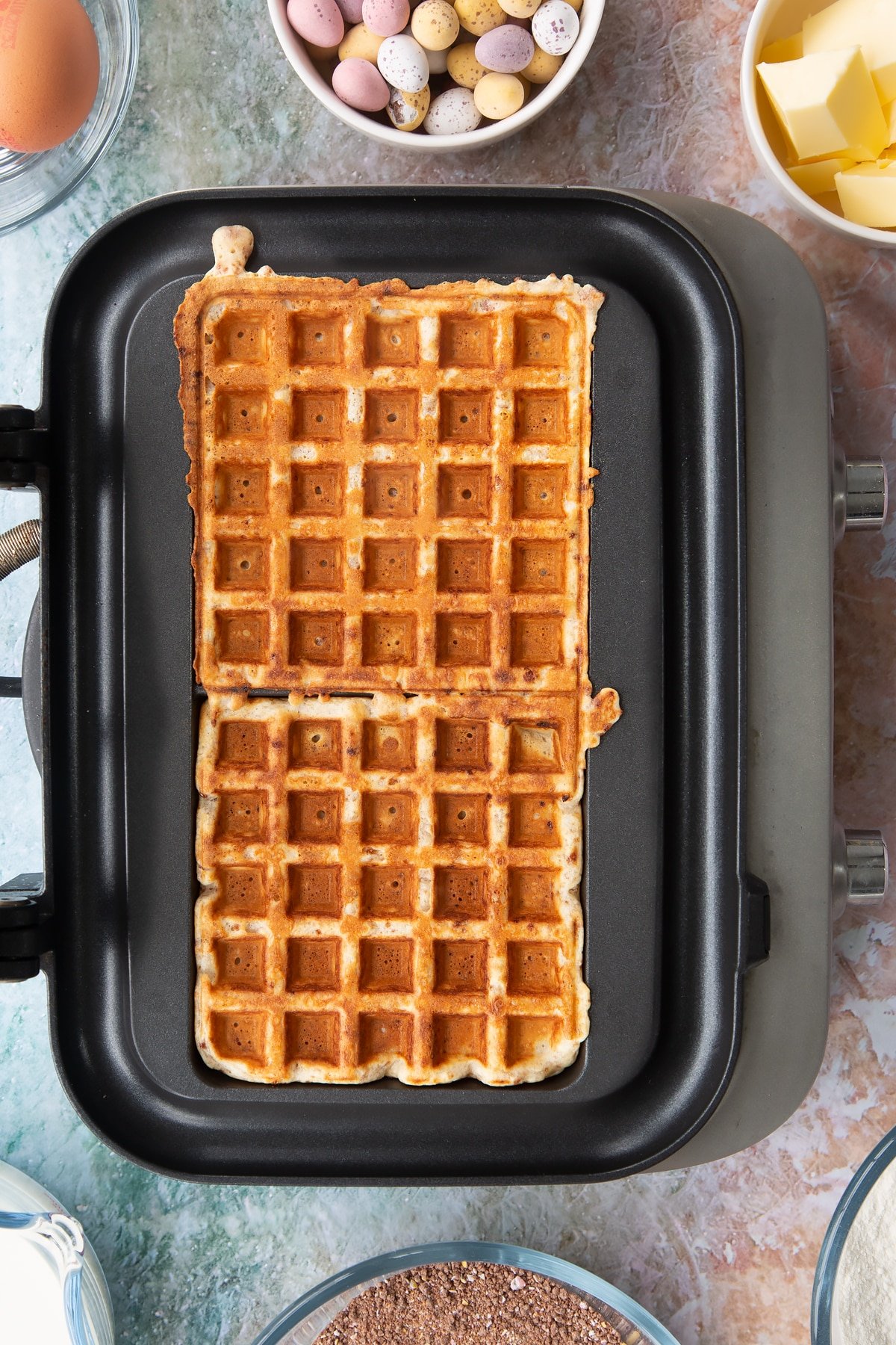 Mini Egg waffles, freshly cooked in a waffle maker.