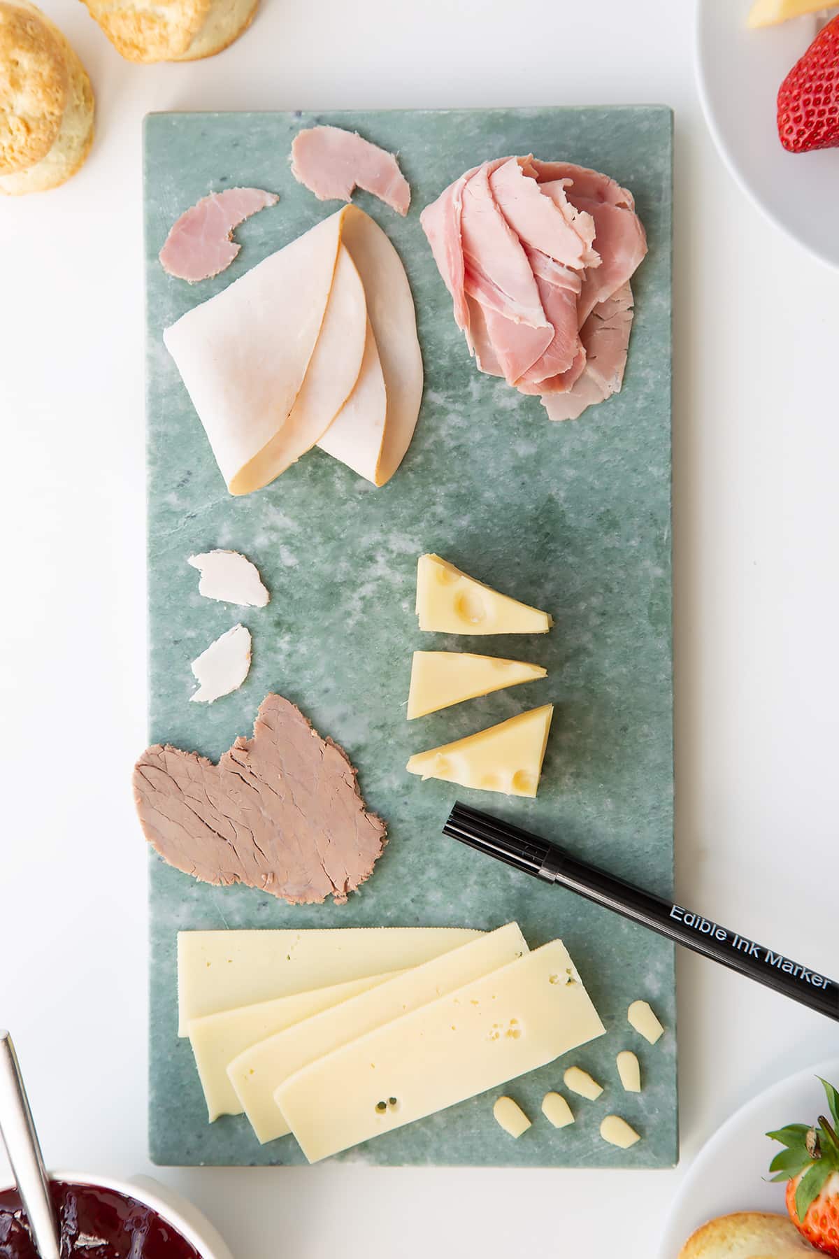 Overhead shot of the ingredients required for a Tom and Jerry afternoon tea.
