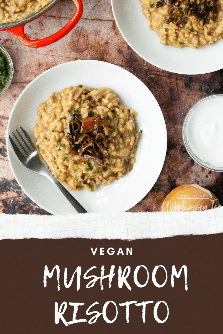 Vegan mushroom risotto in a shallow white bowl with a fork. Caption reads: vegan mushroom risotto