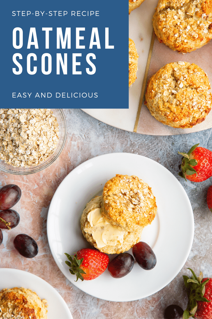 Oatmeal scone on a white plate, shown from above. It has been split and buttered. Caption reads: Step-by-step recipe Oatmeal Scones. Easy and delicious.