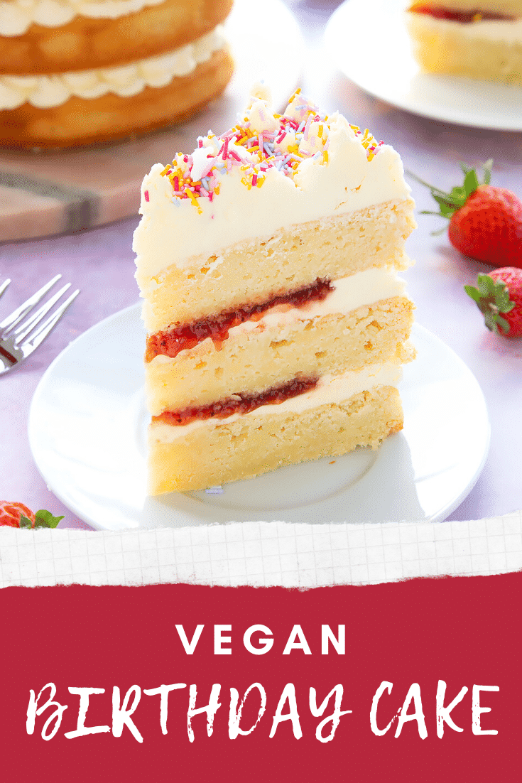 Slice of vegan birthday cake on a small white plate. Caption reads: Vegan birthday cake.