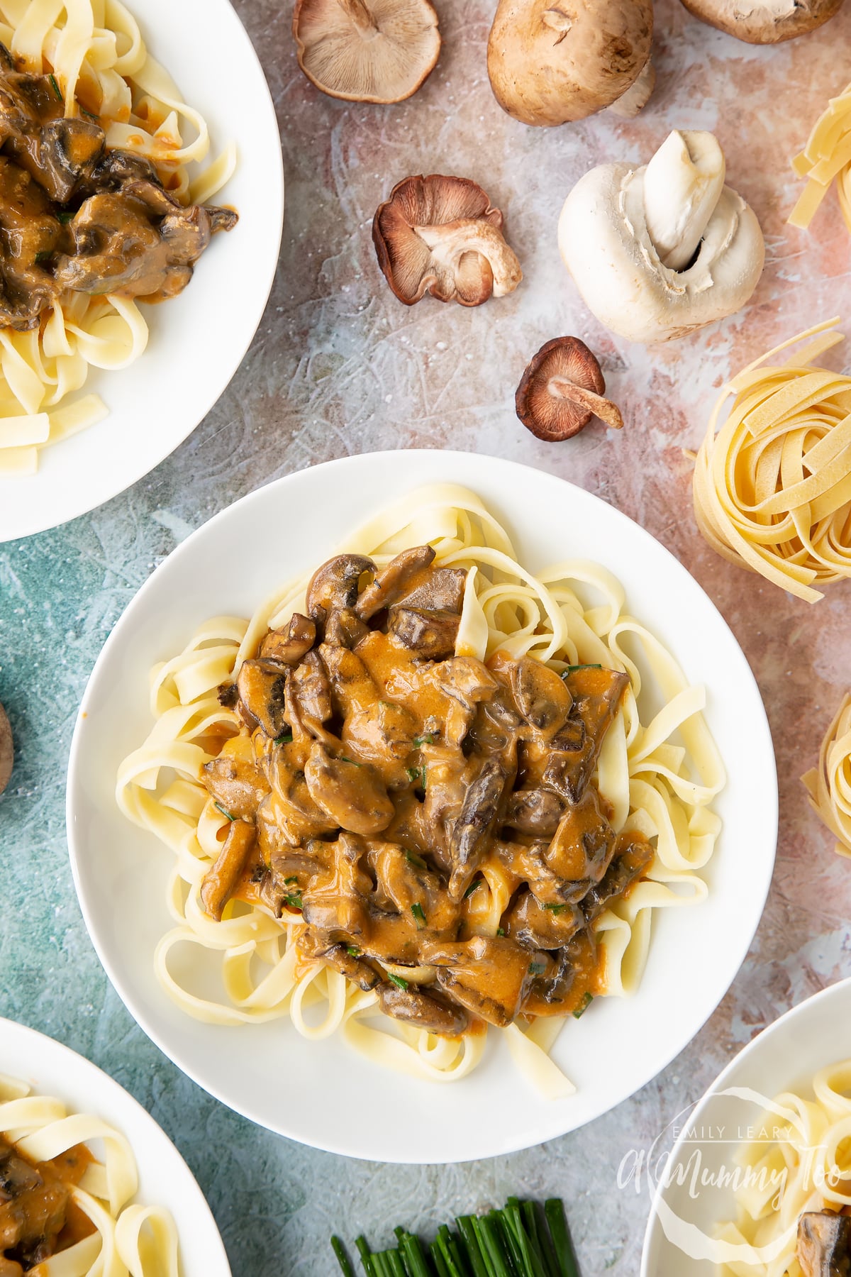 over head view of Creamy vegan mushroom stroganoff on a bed of taglietelle