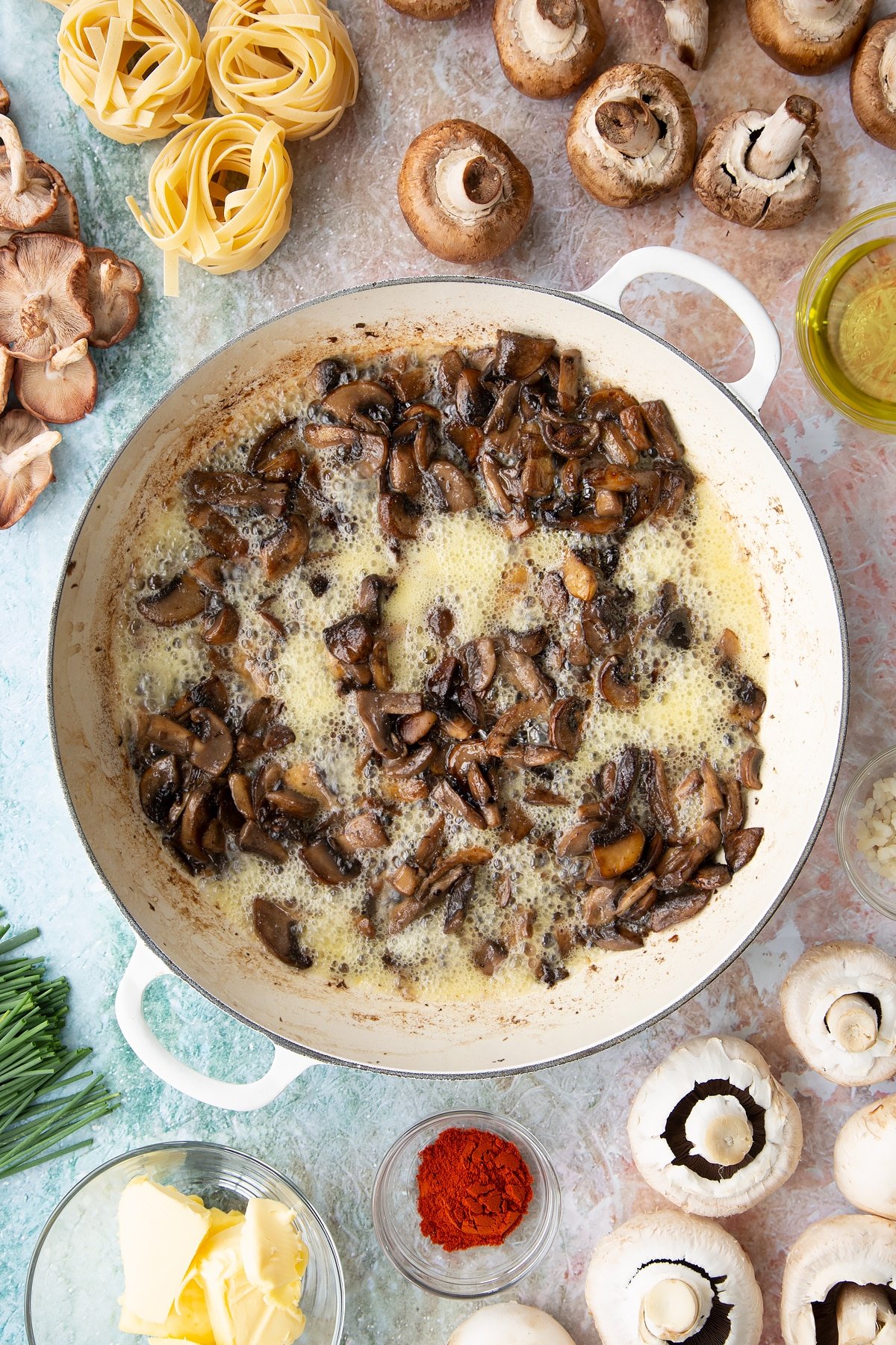 sauteed mushrroms in butter, wine and garlic until bubbling in a large white pan. 