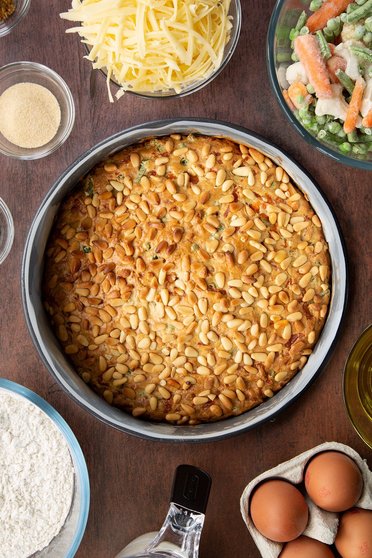 Freshly baked vegetable cake in a lined tin.