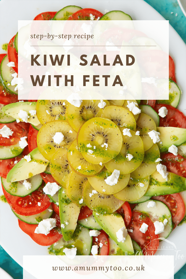Close up of kiwi feta salad on an oval white platter, shown from above. Step-by-step recipe. Caption reads: Kiwi feta salad. 