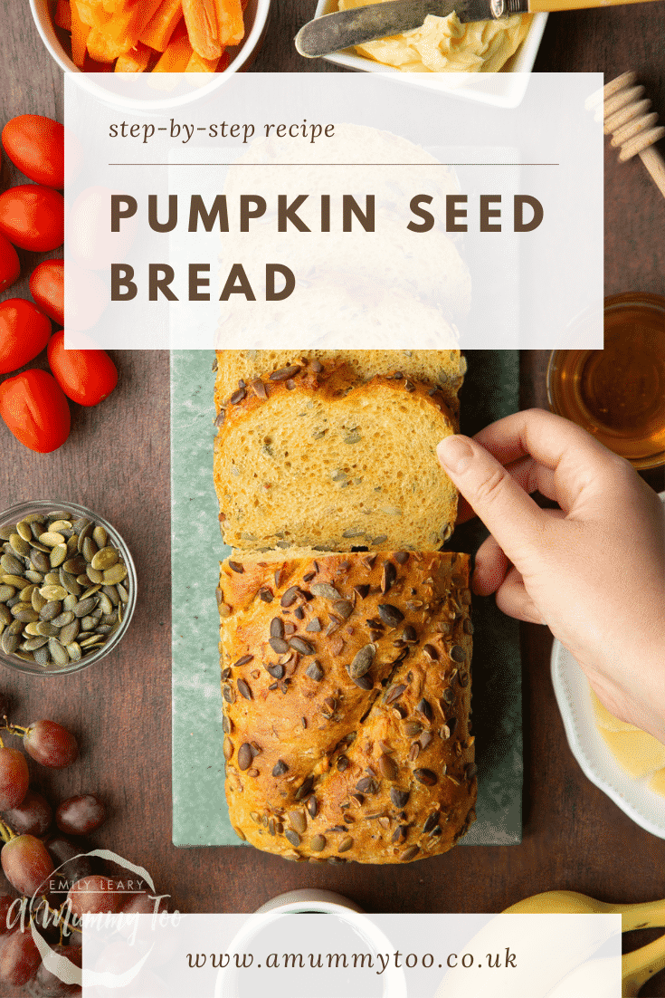 Sliced loaf of pumpkin seed specie on a marble board. a hand reaches for a slice. Caption reads: Step-by-step recipe pumpkin seed bread.