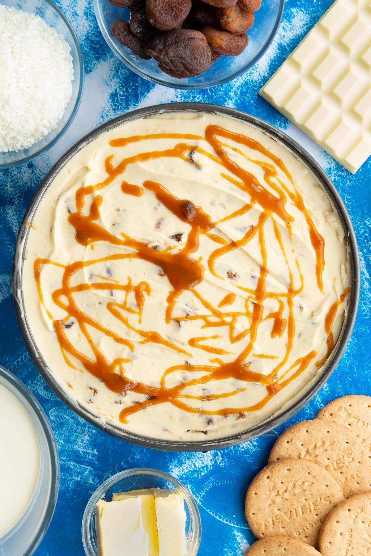 Apricot cheesecake with apricot syrup drizzled on top.