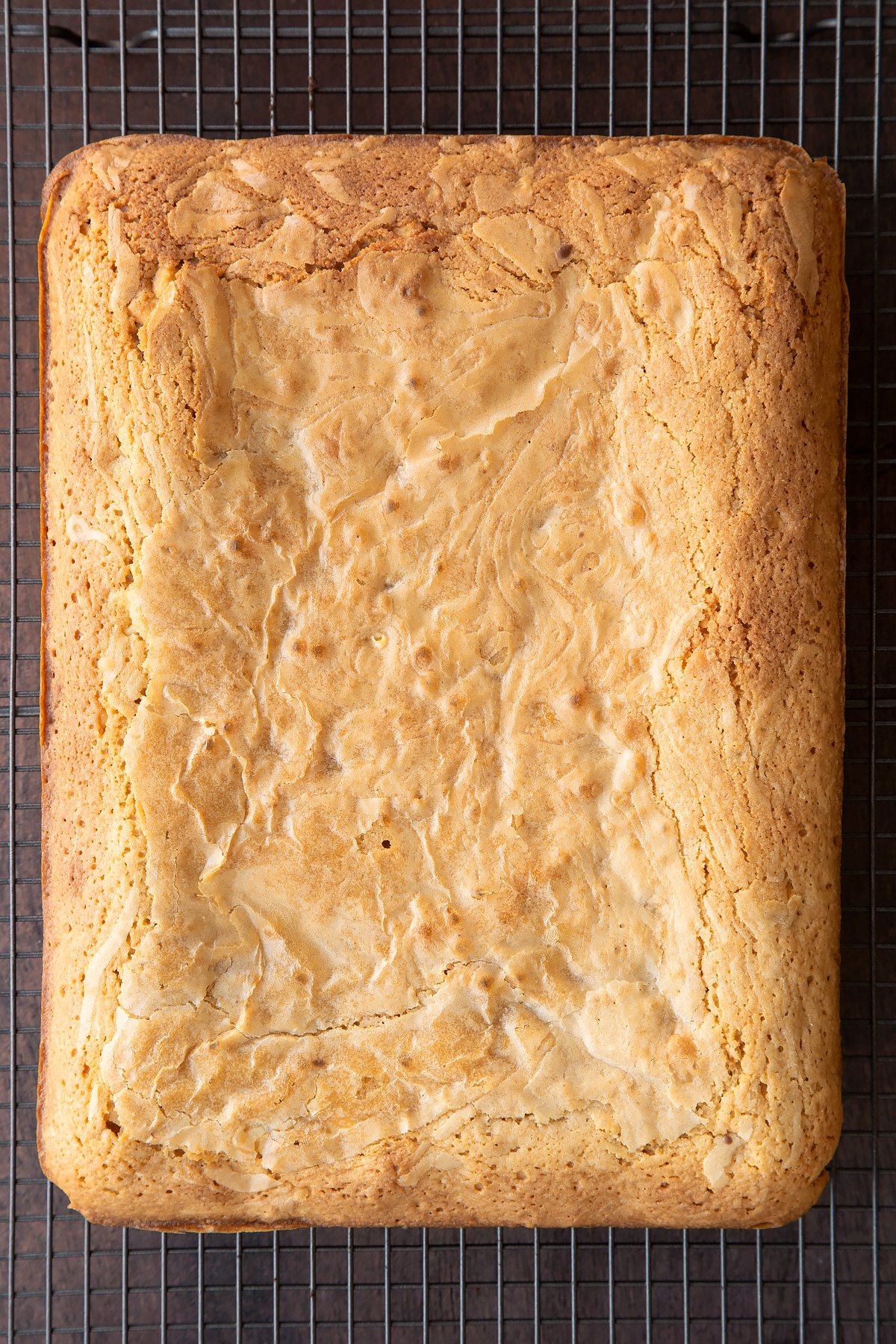 Freshly baked Baileys blondie on a wire rack.