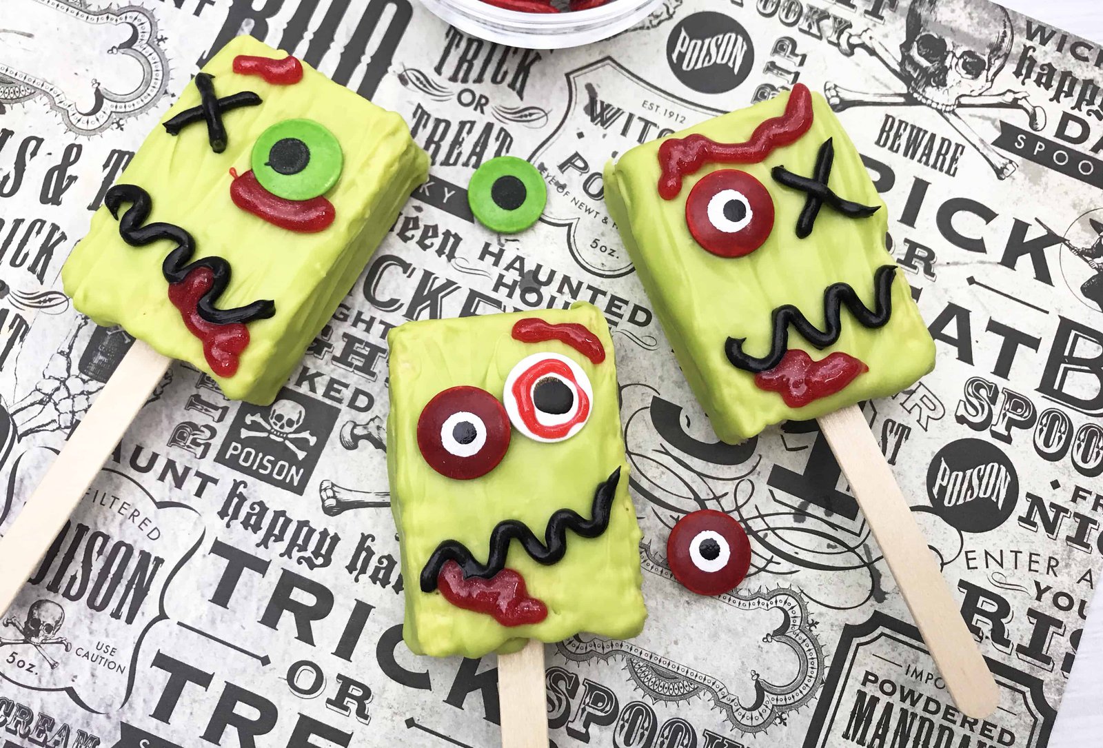 Zombie party treats - rectangular cake pops decorated to look like green monsters.