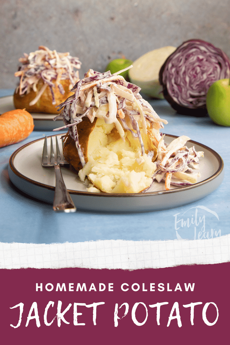 Jacket potato open. with homemade coleslaw on a plate with a fork. Caption reads: Homemade coleslaw jacket potato