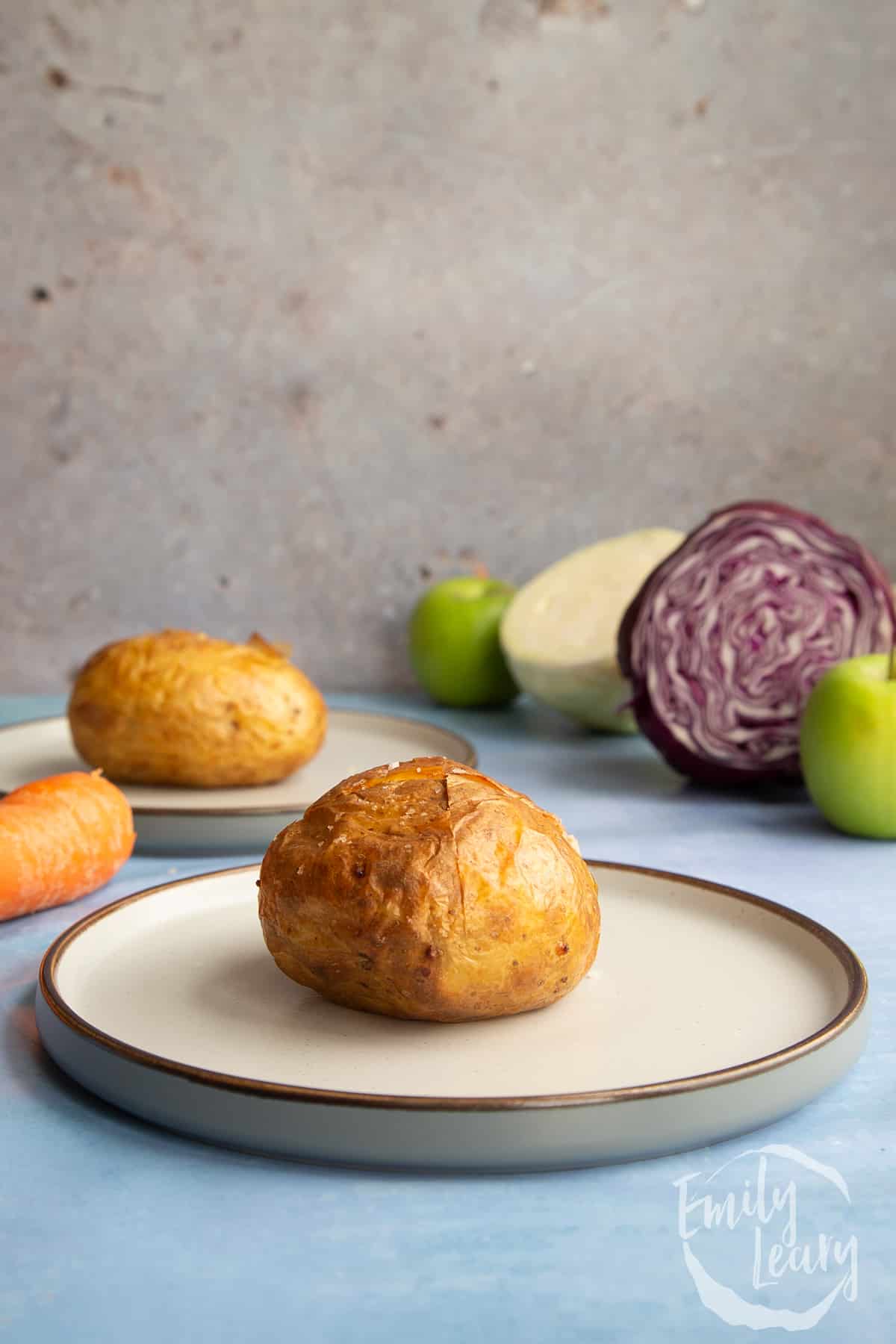 Baked potato on a plate.