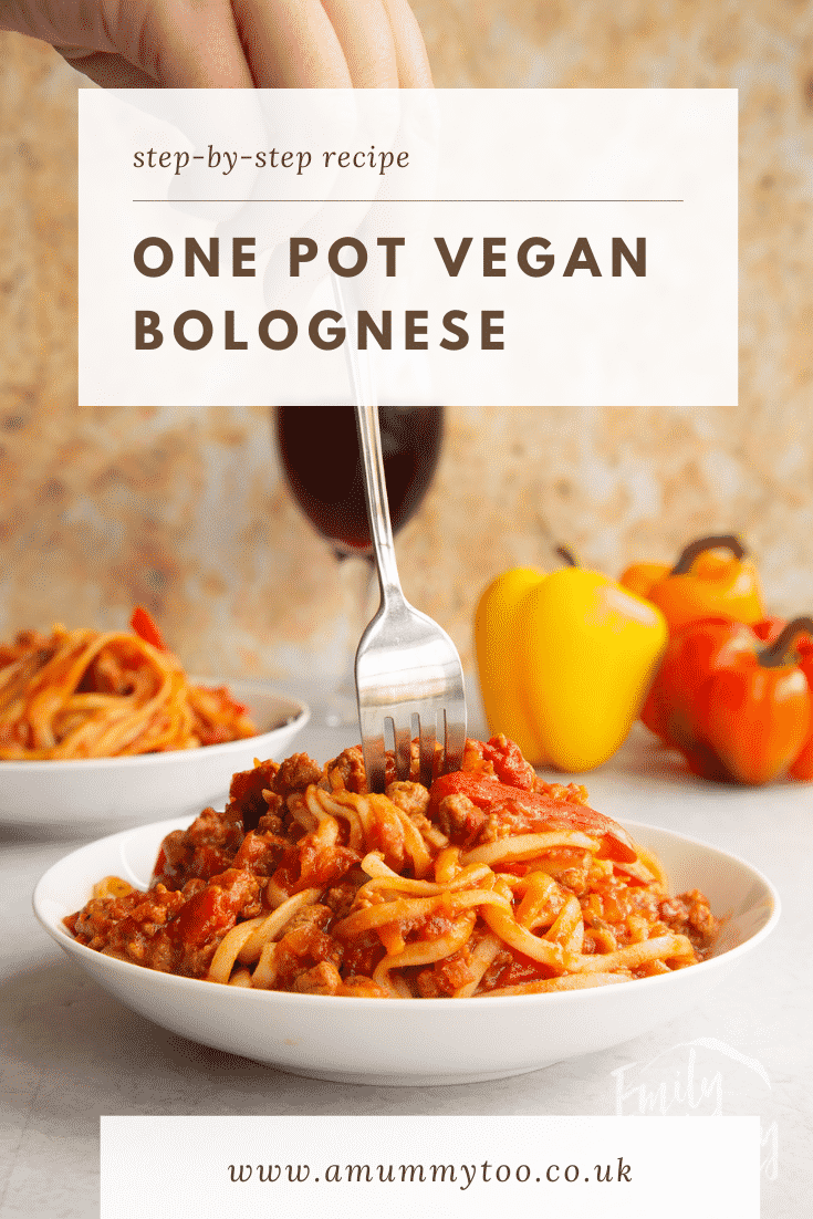 One pot vegan bolognese in a shallow white bowl. A hand delves a fork into the bowl. Caption reads: step-by-step recipe one pot vegan bolognese