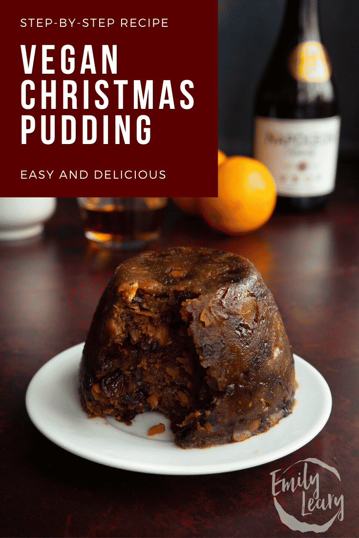 Steamed vegan Christmas pudding on a white plate. Some has been served. Caption reads: Step-by-step recipe. Vegan Christmas pudding. Easy and delicious.