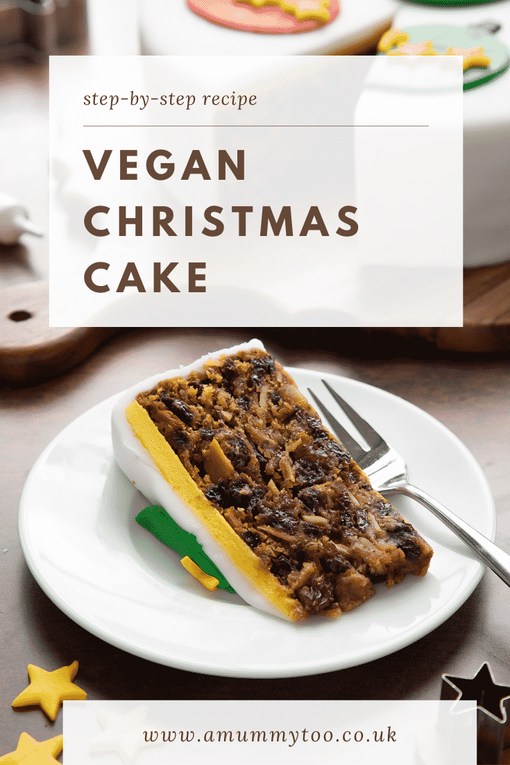 Slice of vegan Christmas cake on a white plate with a fork. Caption reads: Step-by-step recipe. Vegan Christmas cake.