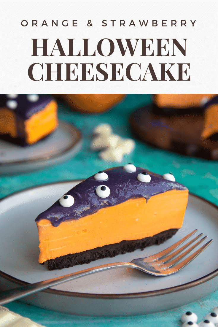 Slice of Halloween cheesecake with an Oreo base on a plate with a fork. Caption reads: Orange & strawberry Halloween cheesecake