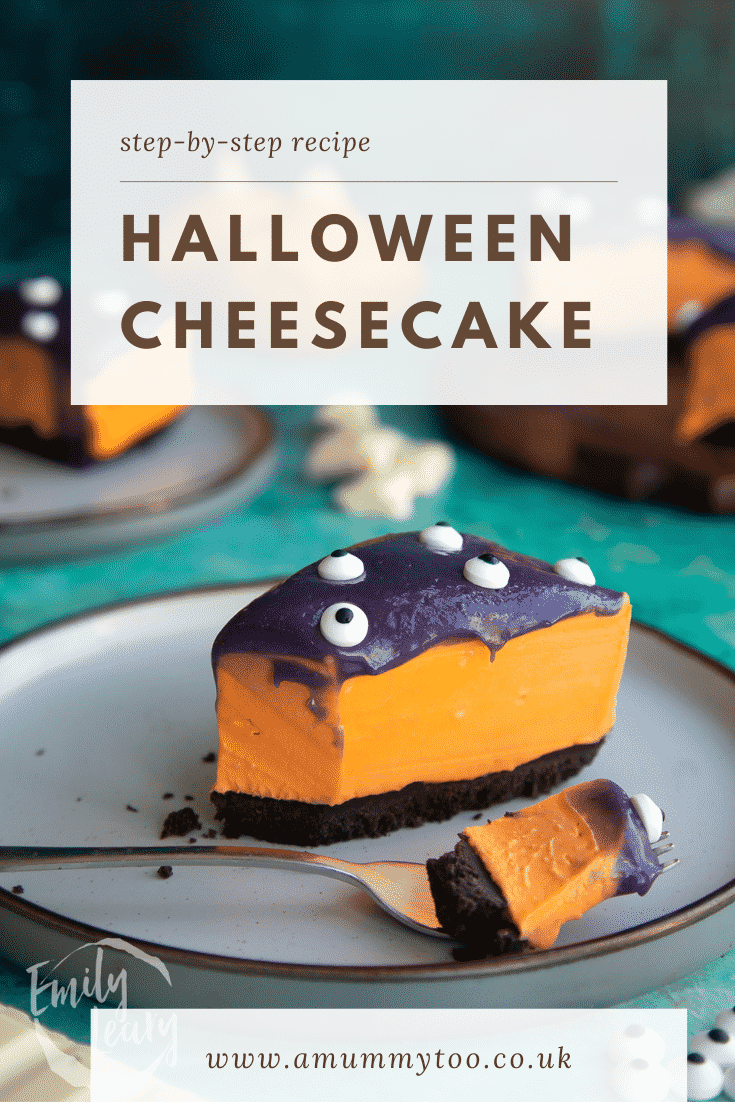 Slice of orange and strawberry Halloween cheesecake with an Oreo base on a plate with a fork, which has taken some. Caption reads: Step-by-step recipe Halloween cheesecake.