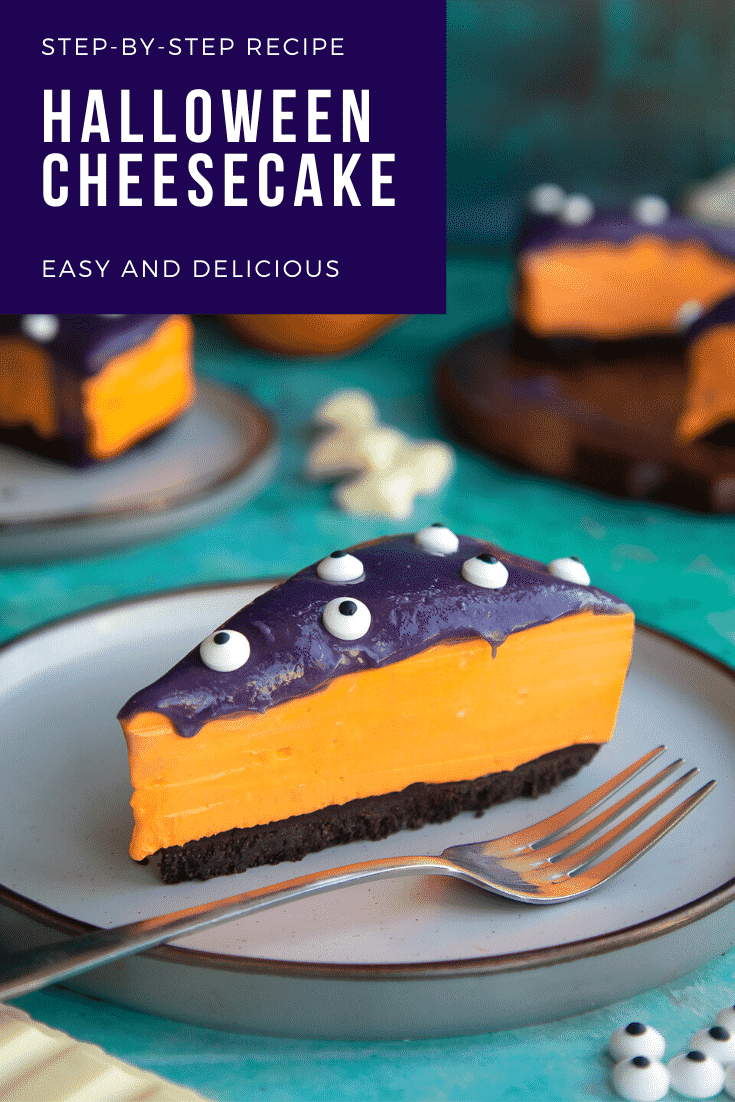 Slice of orange and strawberry Halloween cheesecake with an Oreo base on a plate with a fork. Caption reads: Step-by-step recipe. Halloween cheesecake. Easy and delicious.